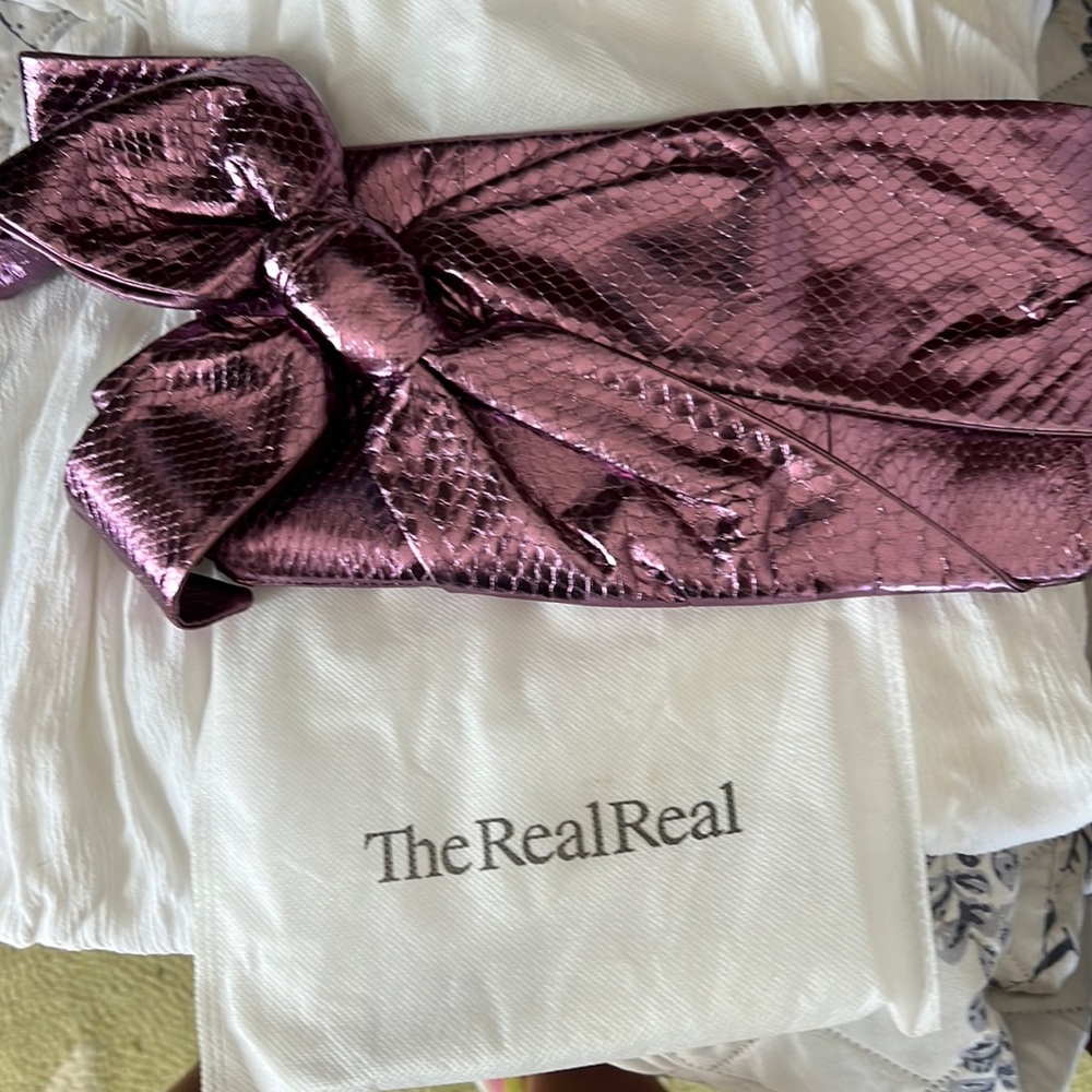 Valentino purple snake bow clutch.